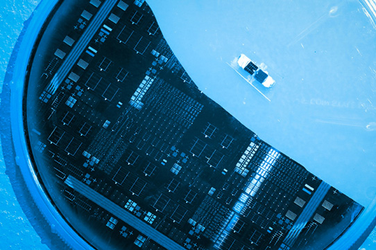 A silicon solar cell with SiGe filter using a step-cell design (large) and a GaAsP layer on silicon step-cell proof-of-concept solar cell (small). (Photo: Tahra Al Hammadi/Masdar Institute News.) 