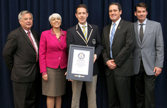 Philip Robertson (center), representing Guinness World Records, presents the certificate for the fastest integrated circuit amplifier to (from left): Dr Dale Burton, sector VP & chief technology officer Northrop Grumman Aerospace Systems; DARPA director Dr Arati Prabhakar; DARPA’s Terahertz Electronics program manager Dr Dev Palmer; and Northrop Grumman’s Terahertz Electronics program manager Dr William Deal. 