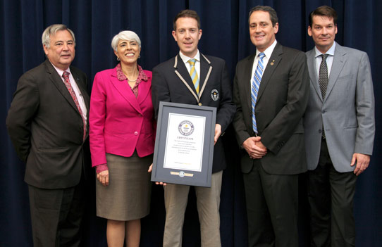 Philip Robertson (center), representing Guinness World Records, presents the certificate for the fastest integrated circuit amplifier to (from left): Dr Dale Burton, sector VP & chief technology officer Northrop Grumman Aerospace Systems; DARPA director Dr Arati Prabhakar; DARPA’s Terahertz Electronics program manager Dr Dev Palmer; and Northrop Grumman’s Terahertz Electronics program manager Dr William Deal. 