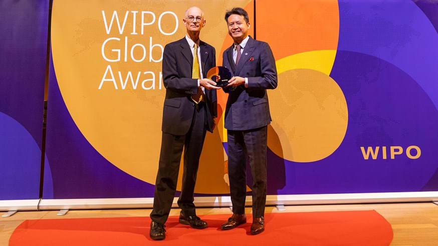 World Intellectual Property Organization director general Daren Tang presents the award to Quinas chief scientific officer professor Manus Hayne at an awards ceremony in Geneva. 