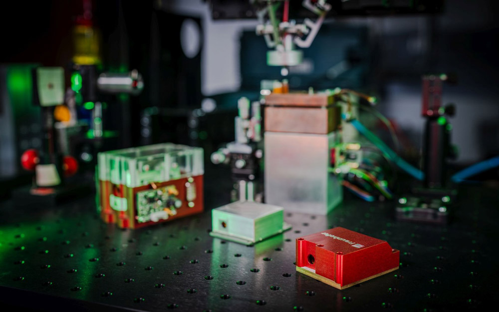 Three generations of MOEMS-EC-QCL modules (from left to right). 