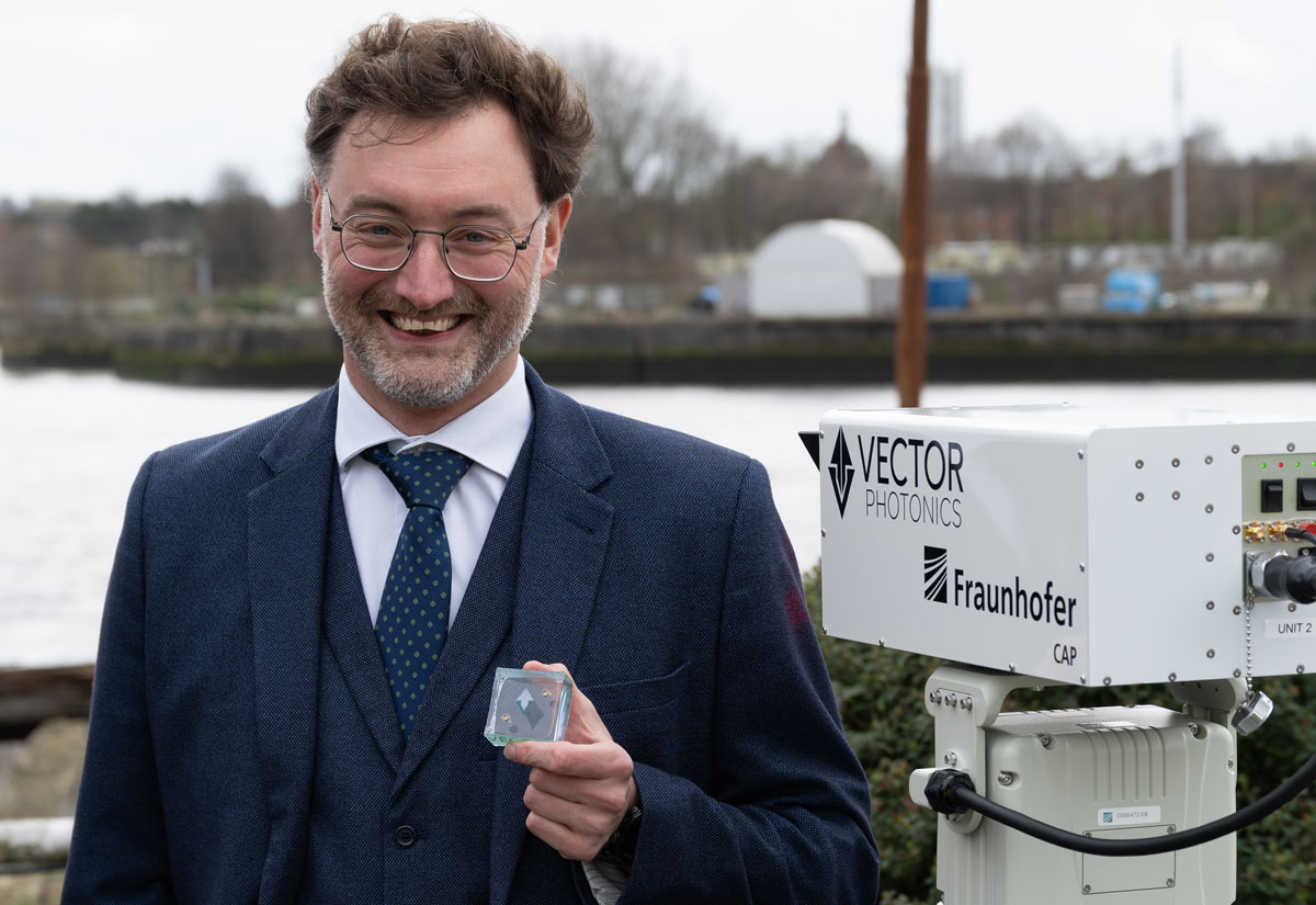 Vector Photonics’ CEO & founder Dr Richard Taylor with the PCSEL and optical communications system at the demo across the River Clyde.