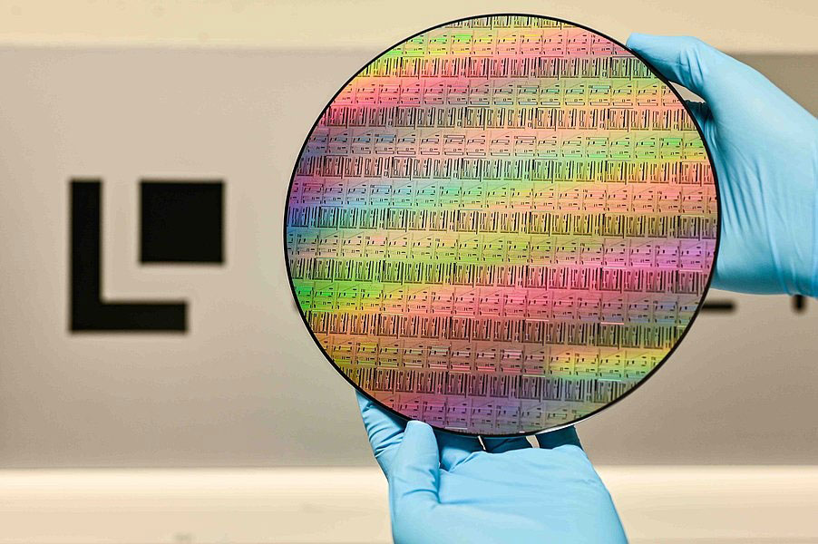 A 200mm wafer with photonic integrated circuits. 