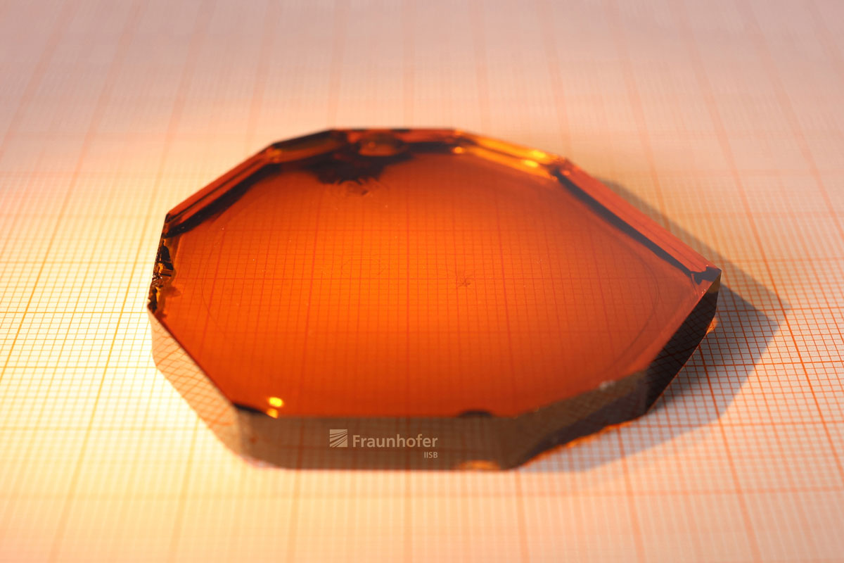 Aluminium nitride crystal with a diameter of 2-inches – grown in the Joint Lab of Fraunhofer IISB and PVA TePla (courtesy of Jennifer Reißig/Fraunhofer IISB).